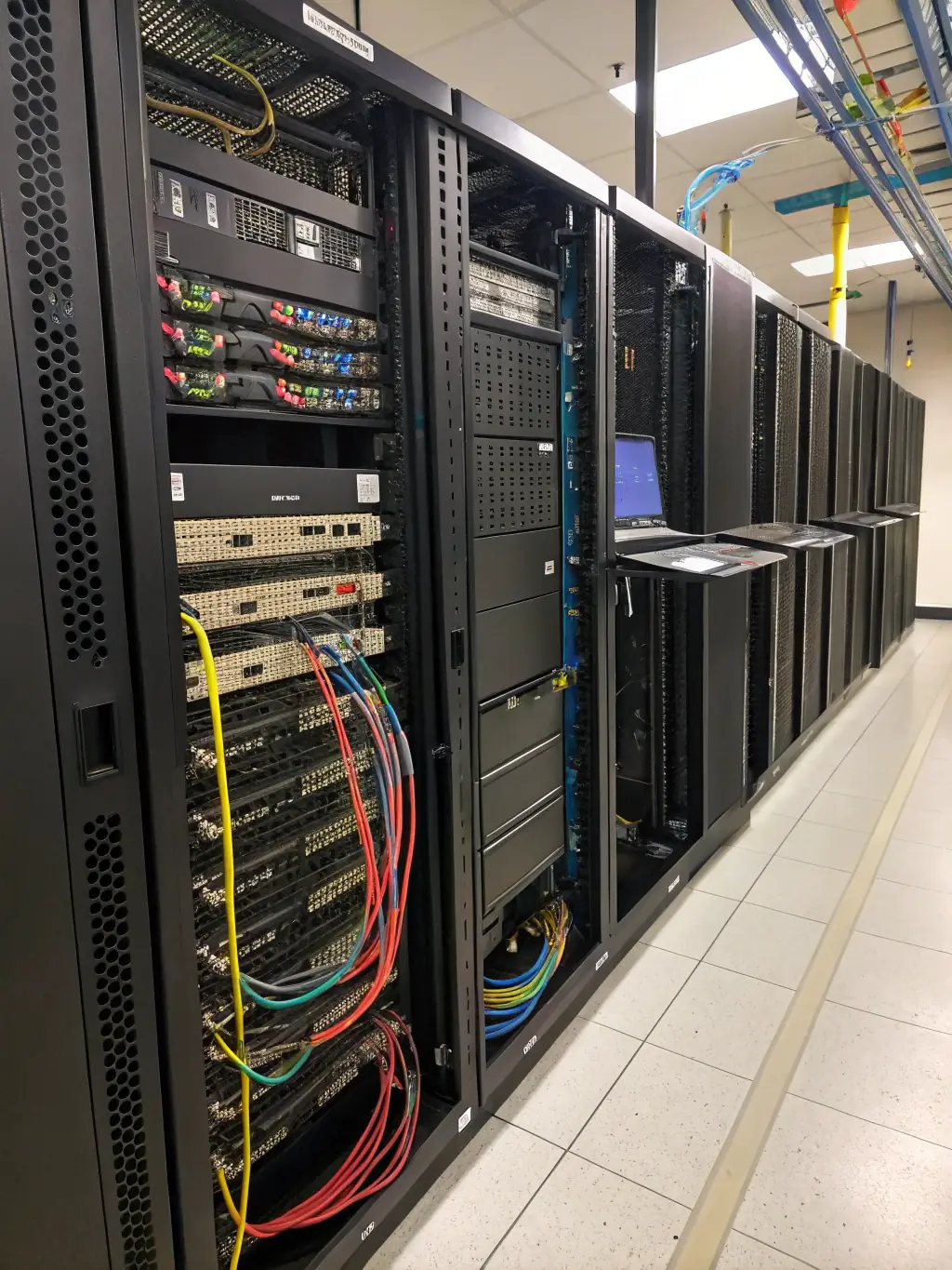 A close-up shot of a rack-mounted Dell PowerEdge server in a data center environment, highlighting its sleek design and robust build quality, used in the SupplySphere project.